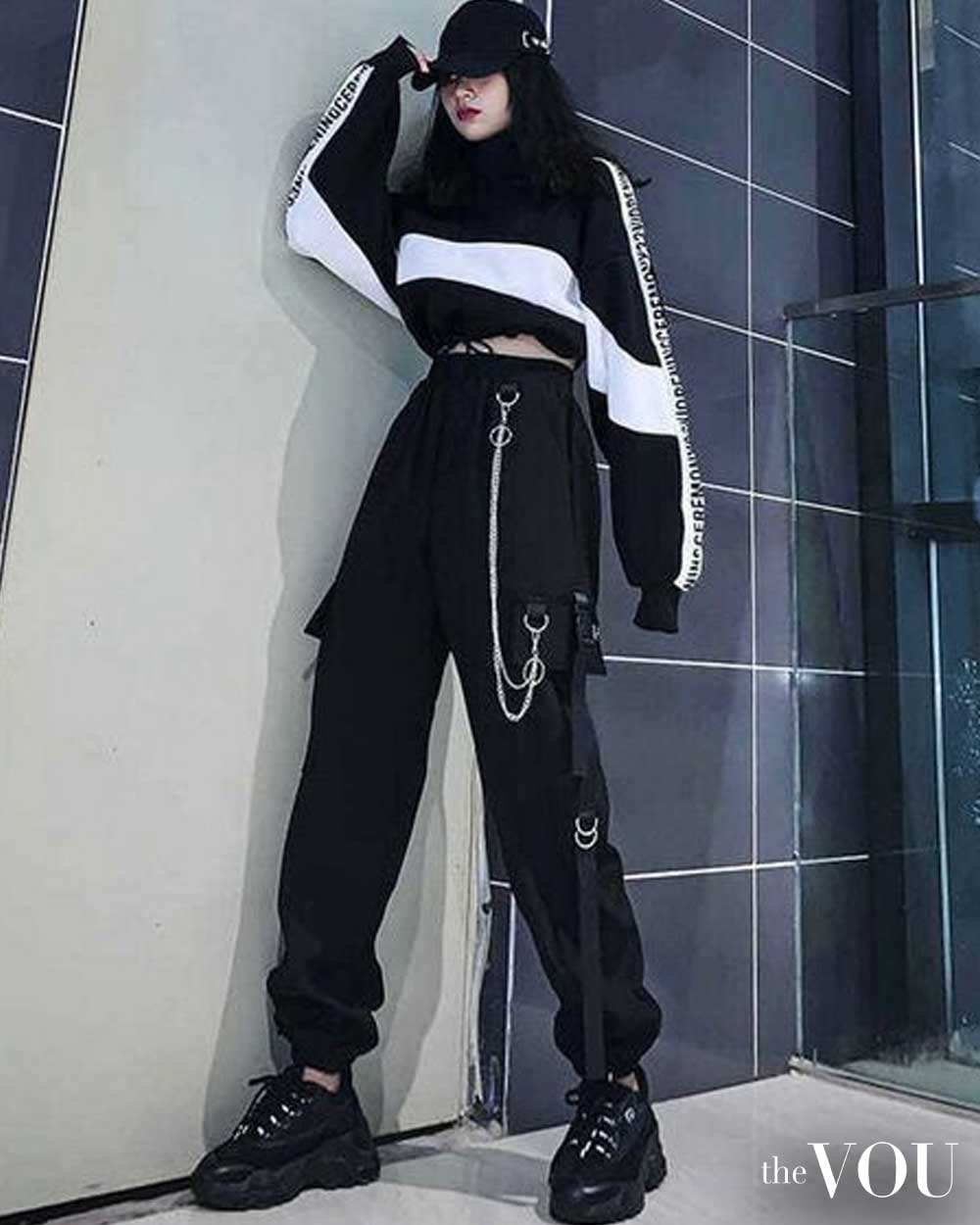 striped crop jumper, cargo pants wth chain details, chunky sneakers, hat
