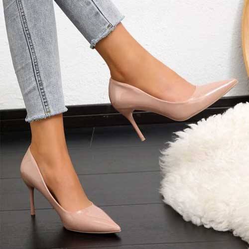 Slip-on heels with point toes in pastel pink patent leather