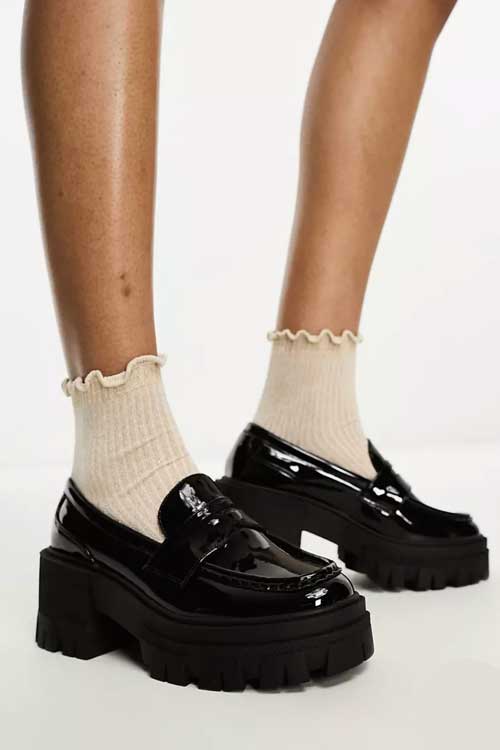 Script chunky mid heeled loafers in black patent