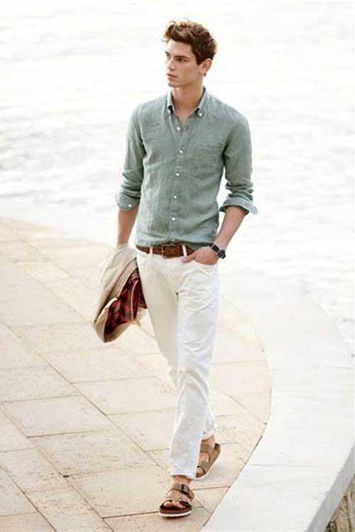 a man wearing a green shirt and white pants in an Old Money casual aesthetic