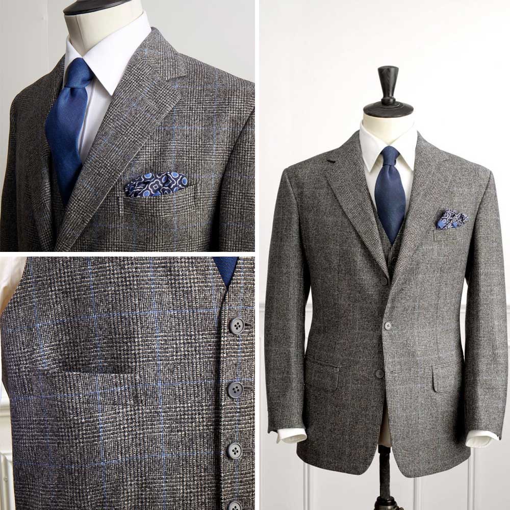 Single-breasted three-piece suit in 14oz grey Prince of Wales check woollen flannel with a blue overcheck. Straight pockets with flaps.