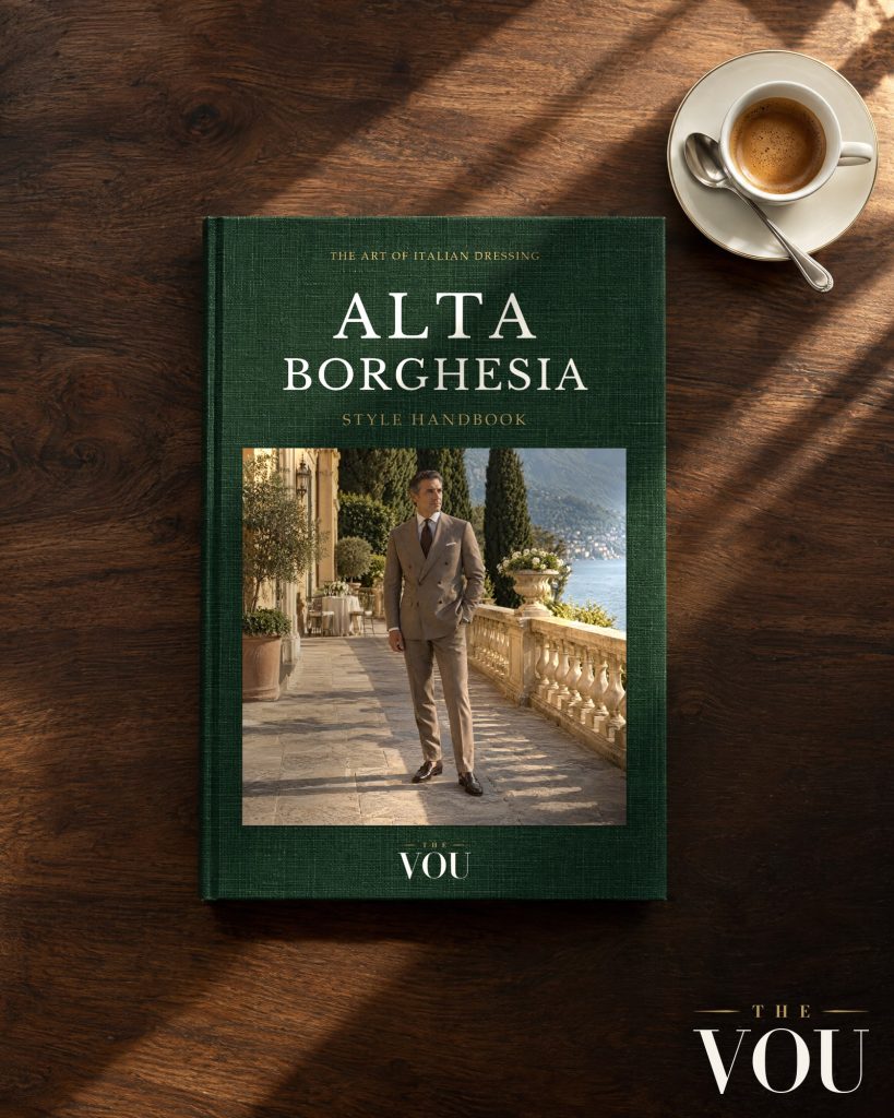 The Alta Borghesia Style Handbook front cover with a lakeside villa photograph beside an espresso cup.